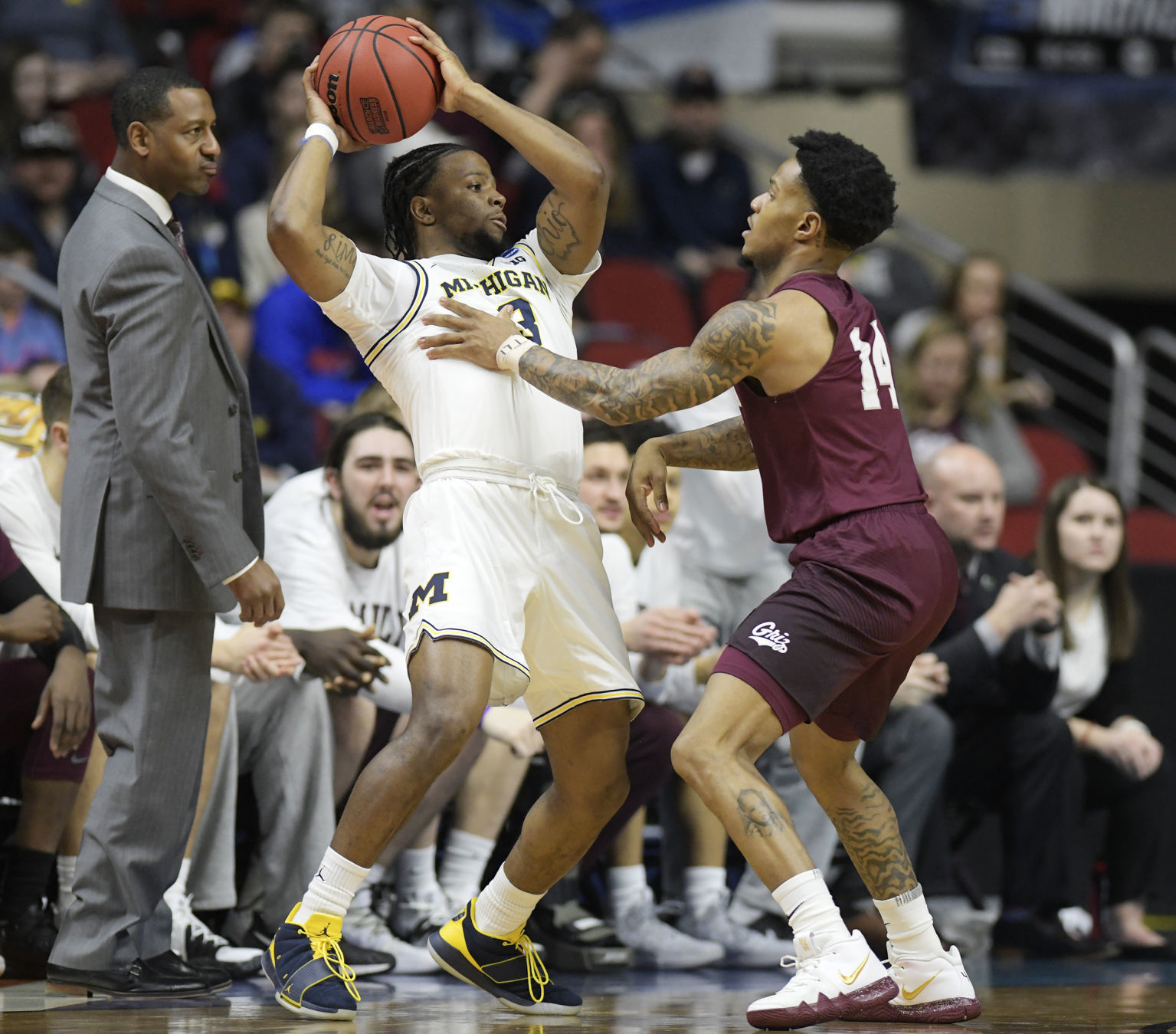Montana falls to Michigan